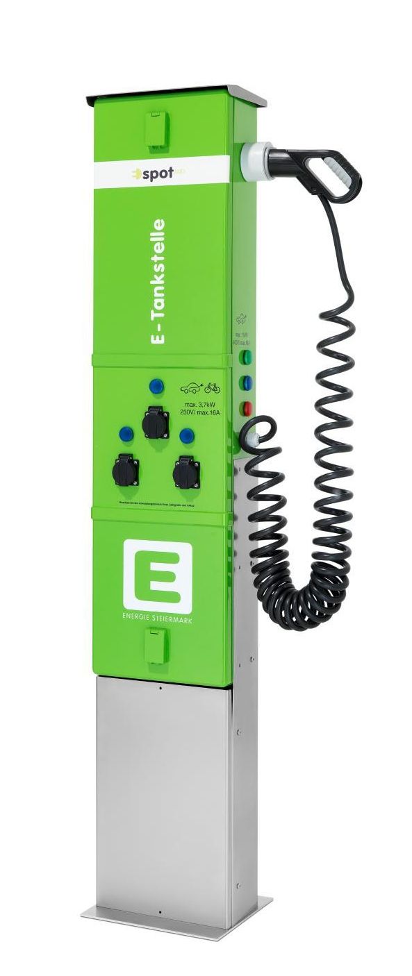 A green E-Tankstelle charging station with a coiled cable and multiple charging ports.