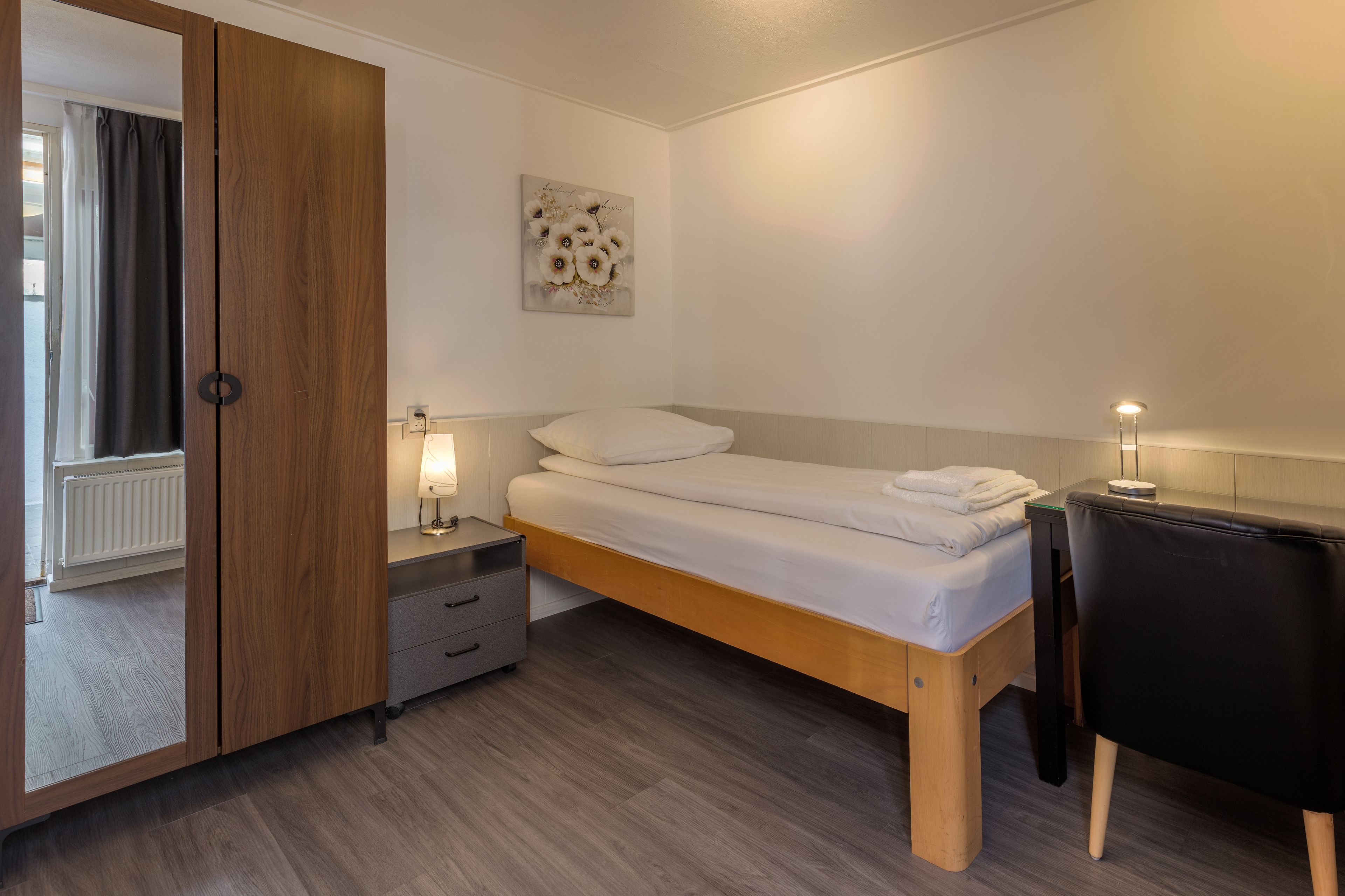 classic single room, private bathroom | individually furnished, desk, iron/ironing board, cots/infant beds