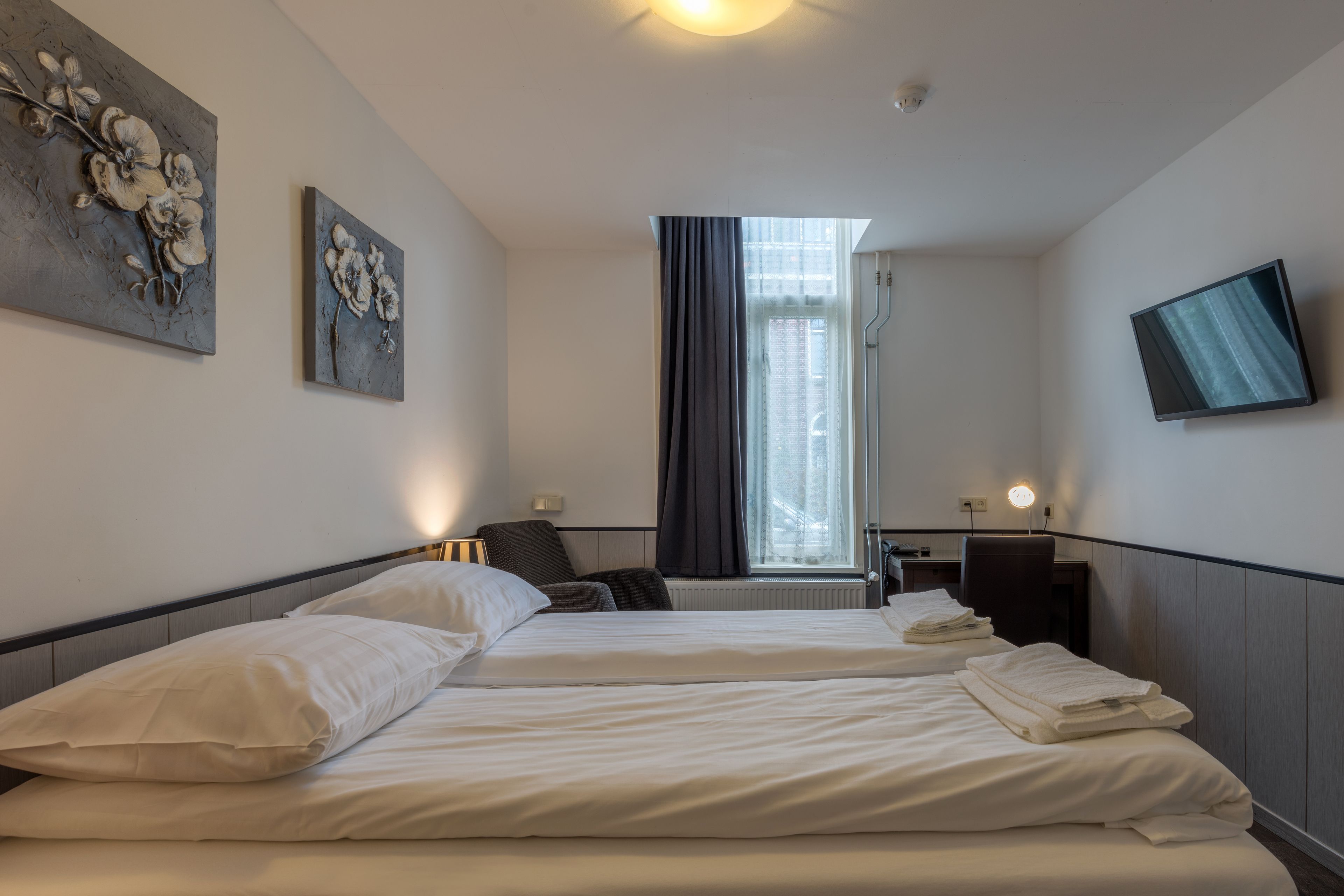 classic double room, private bathroom | individually furnished, desk, iron/ironing board, cots/infant beds