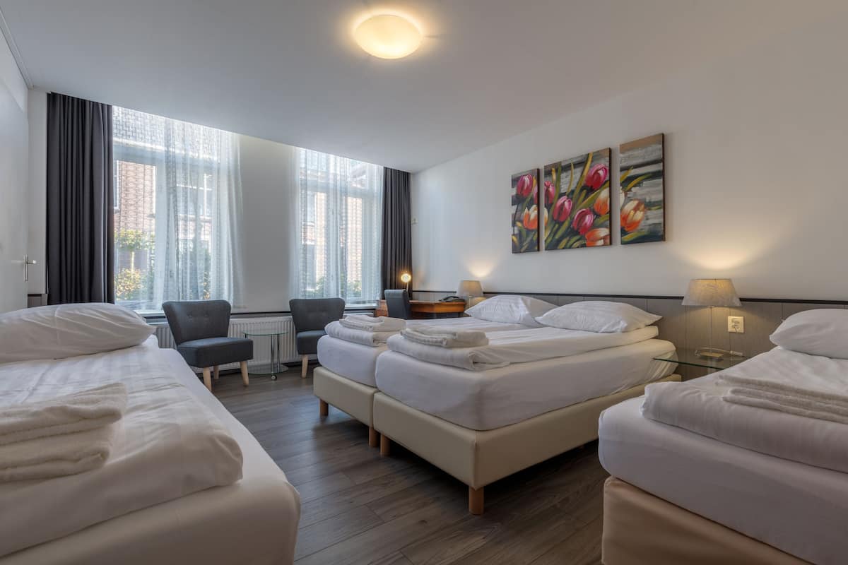 classic quadruple room, private bathroom | individually furnished, desk, iron/ironing board, cots/infant beds