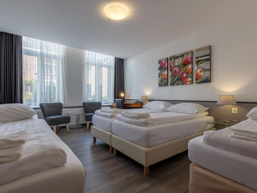 Classic Quadruple Room, Private Bathroom | Individually furnished, desk, iron/ironing board, cribs/infant beds