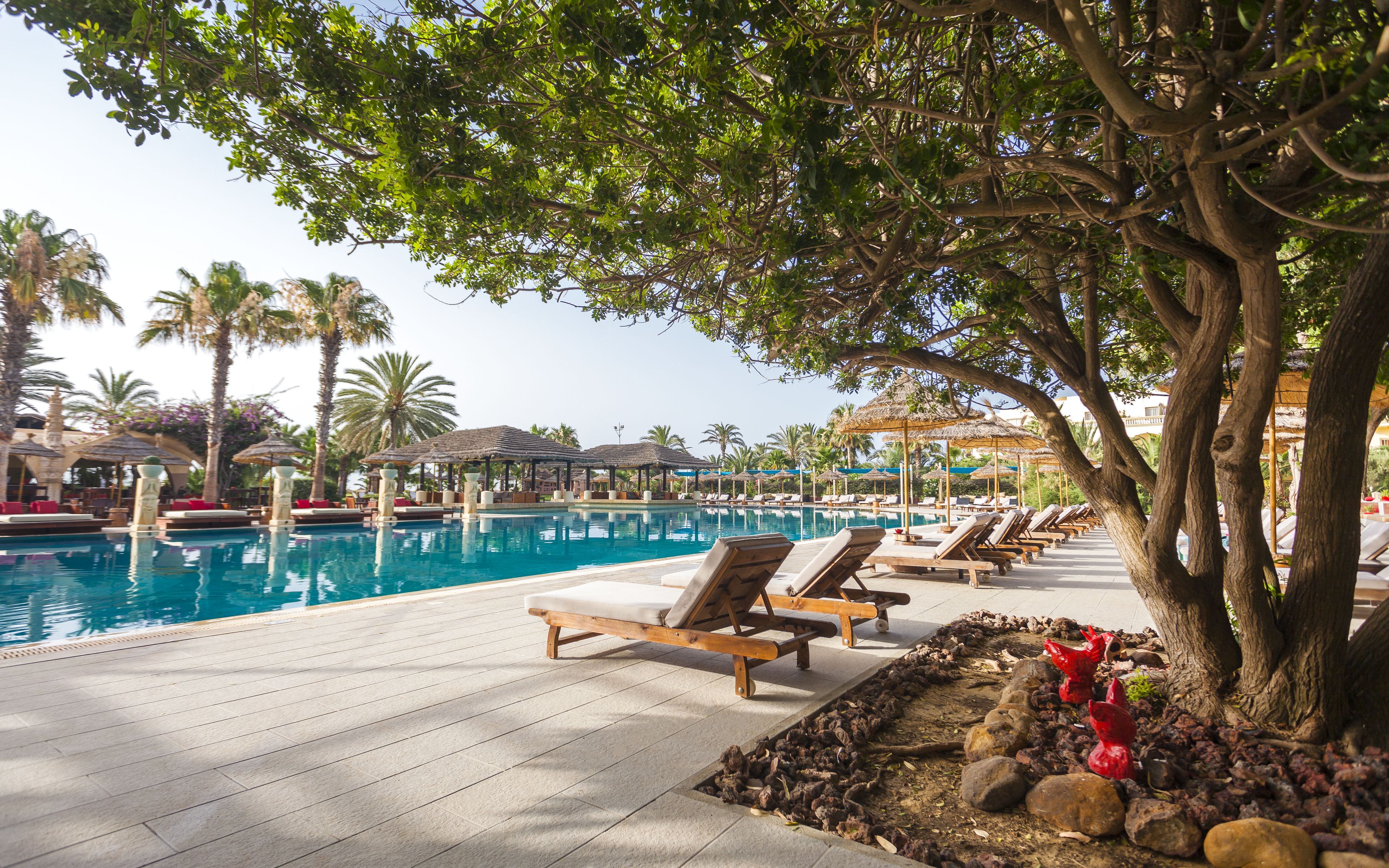 indoor pool, outdoor pool, pool loungers