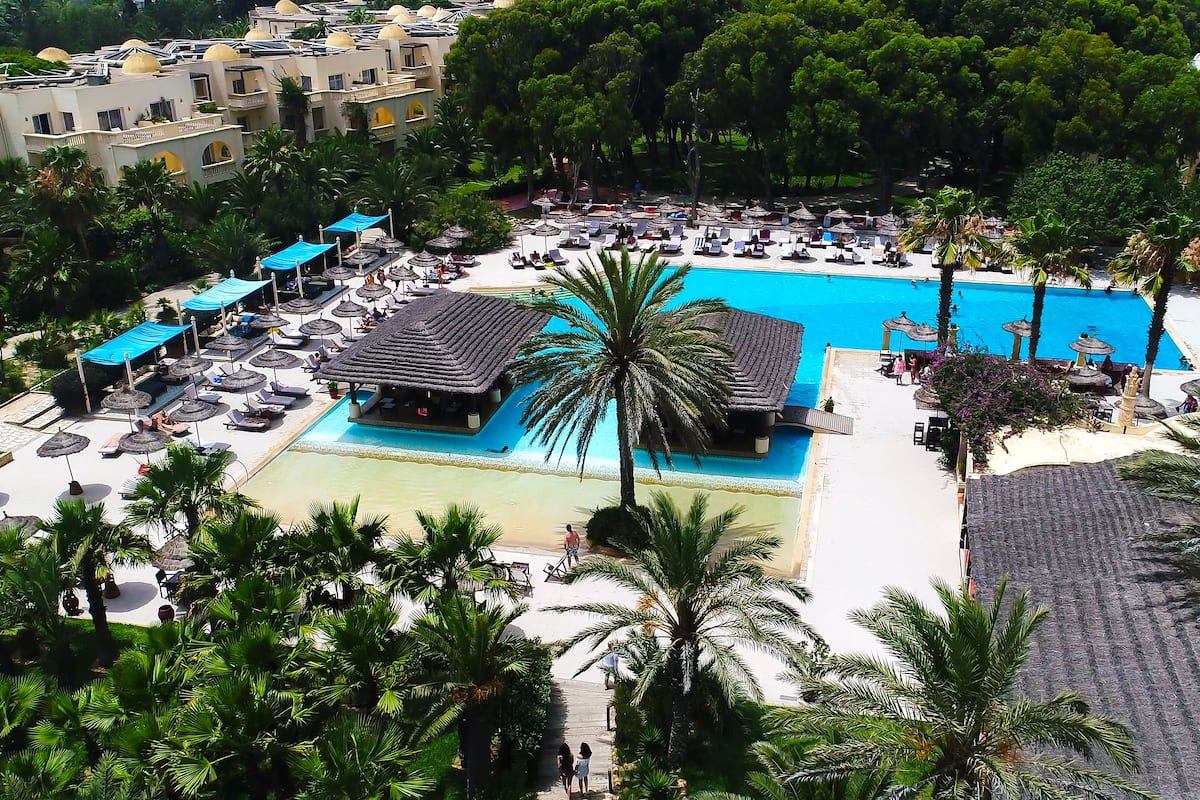 indoor pool, outdoor pool, pool loungers