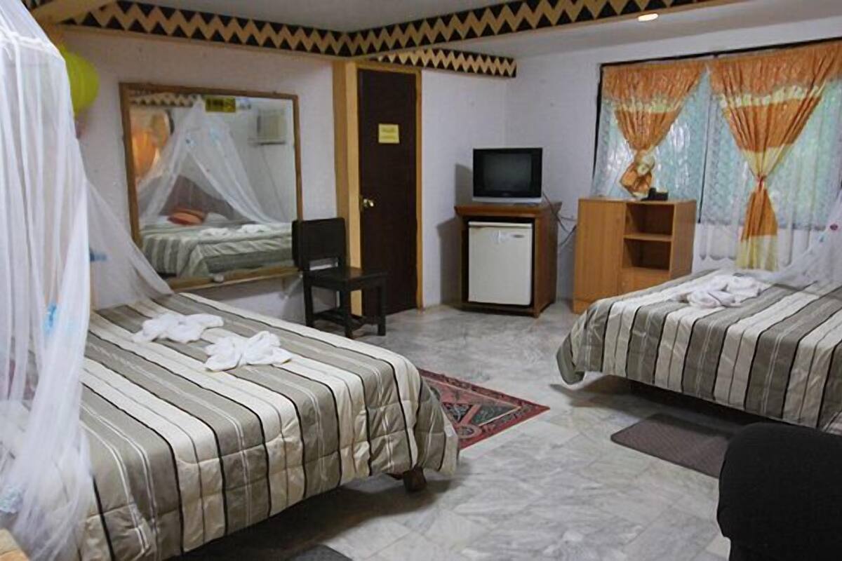 Quadruple Room | Premium bedding, free minibar items, free WiFi, individually furnished