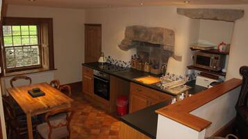 Standard Cottage, 2 Bedrooms | Private kitchen | Coffee/tea maker, electric kettle