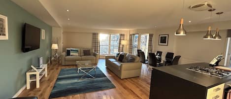 Superior Two King Bedroom Apartment with Sofa Bed | Living room | 50-inch Smart TV with digital channels