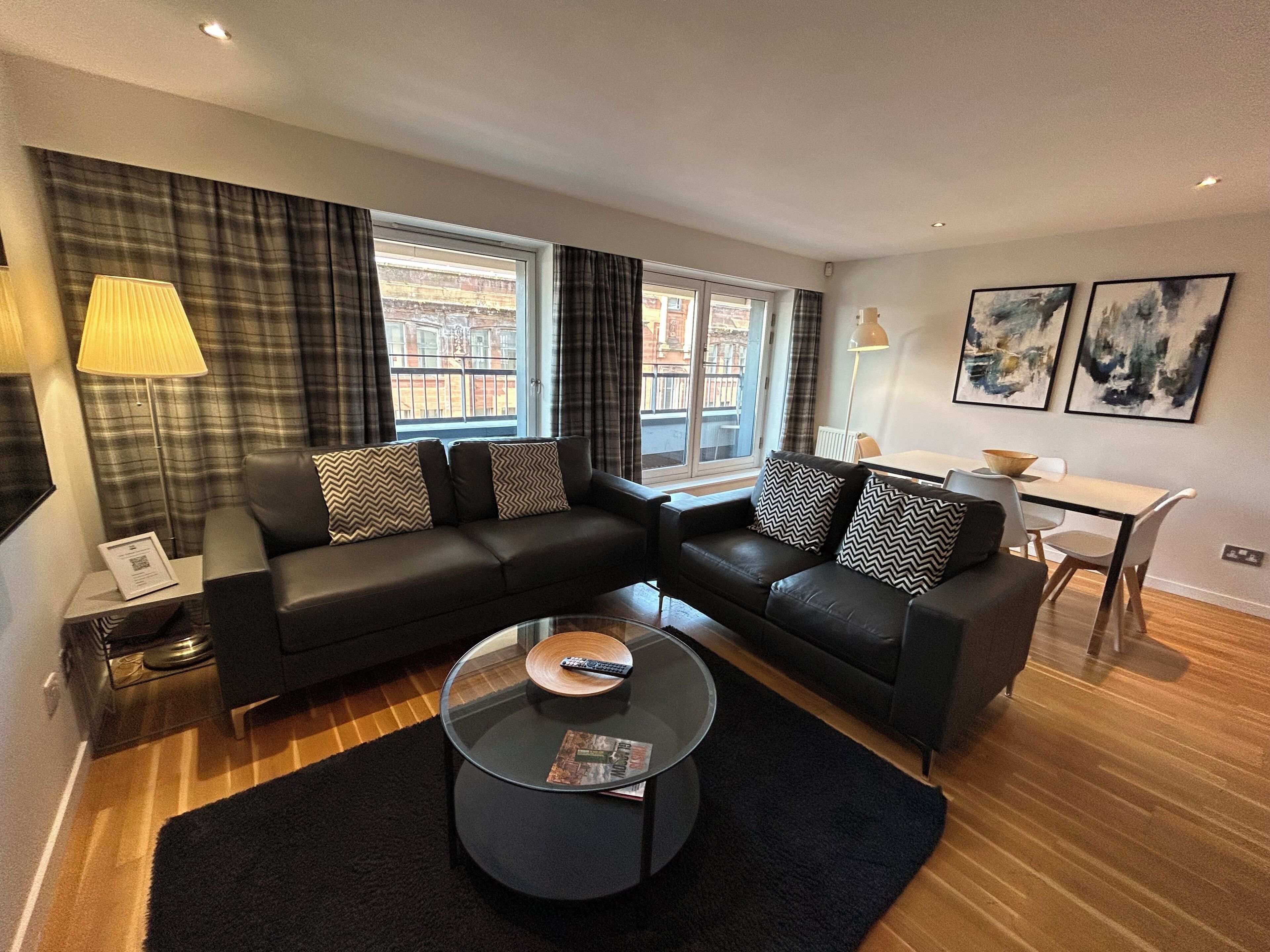Apartment, 2 Bedrooms, Balcony, City View | Living area | 50-inch Smart TV with digital channels