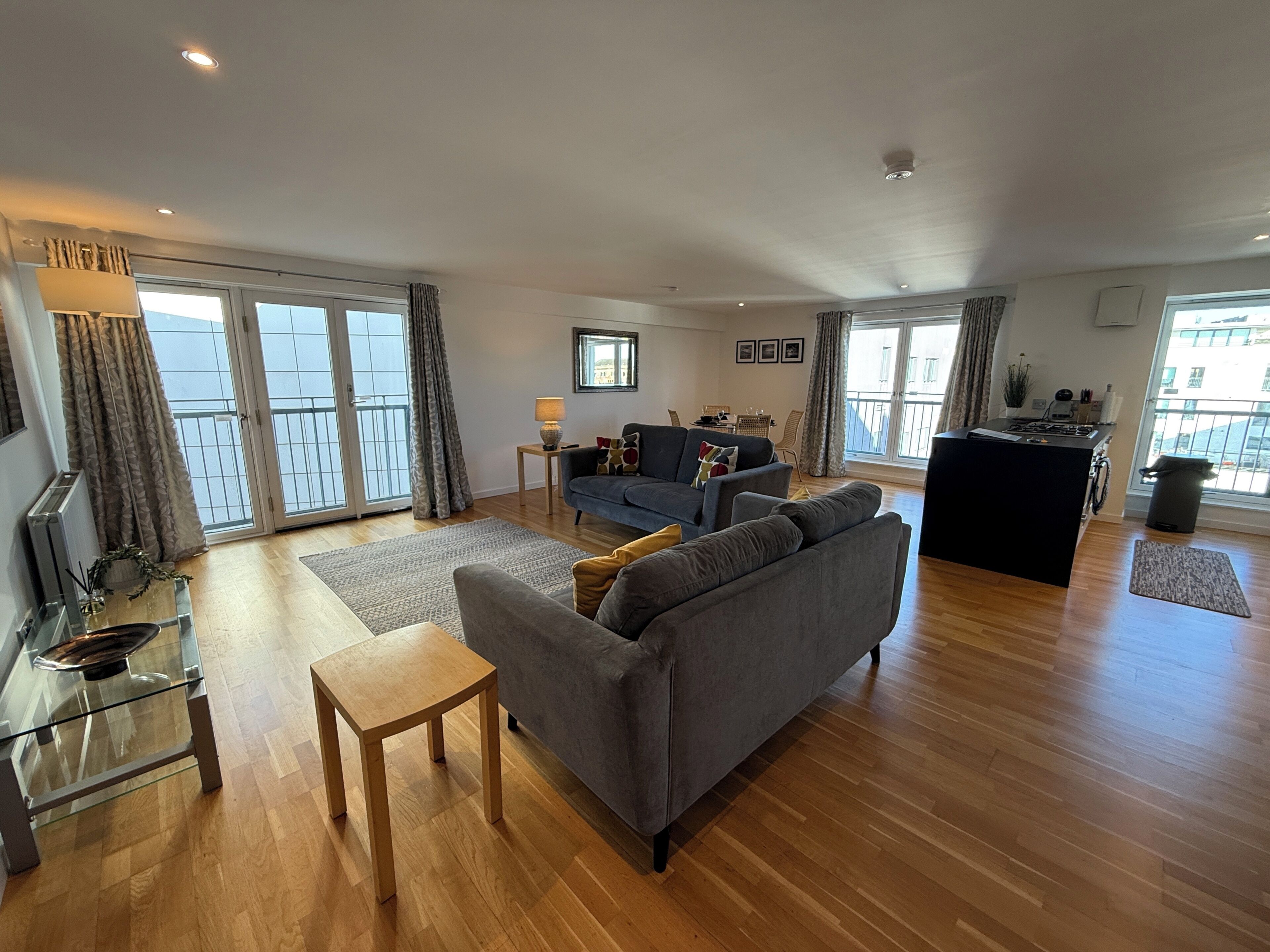 Apartment, 2 Bedrooms, City View | Living area | 50-inch Smart TV with digital channels