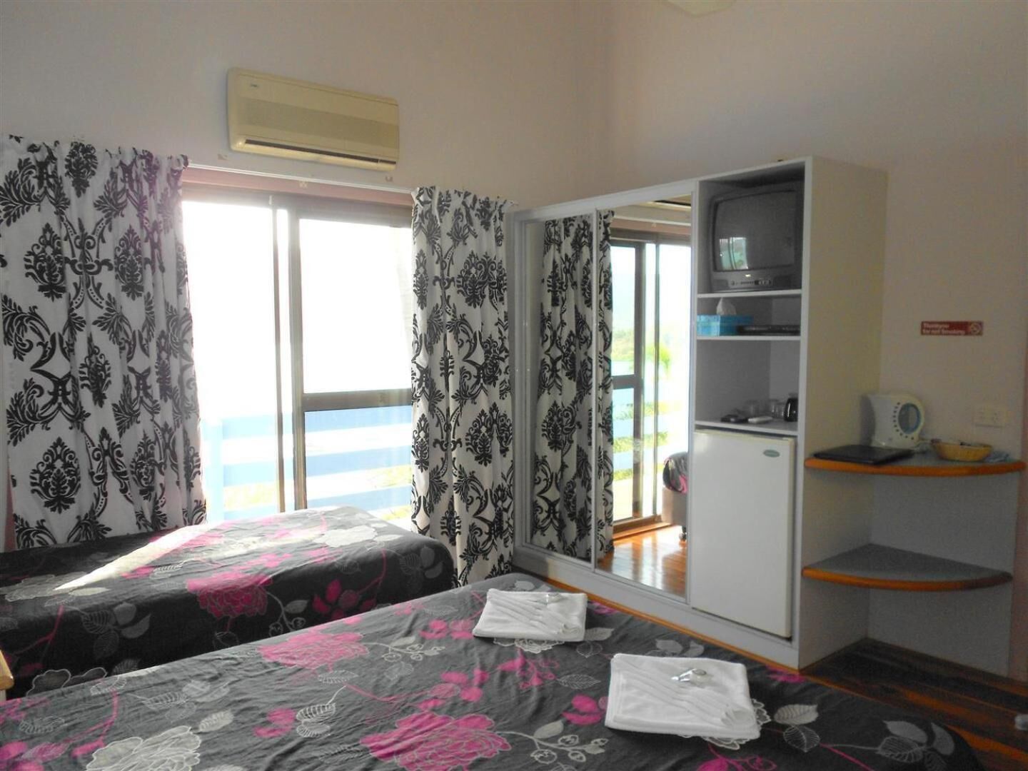 individually decorated, blackout curtains, iron/ironing board