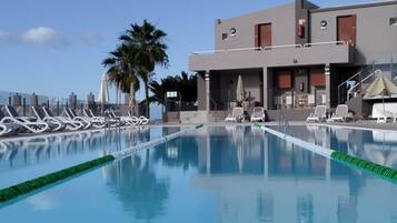 2 outdoor pools, pool umbrellas, pool loungers
