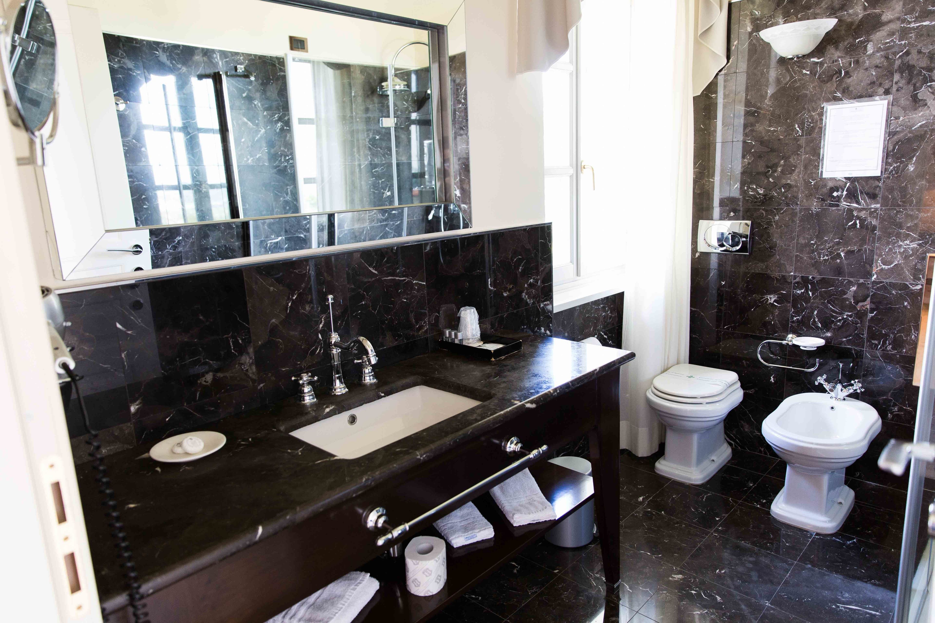 triple room | bathroom | shower, rainfall showerhead, designer toiletries, bathrobes