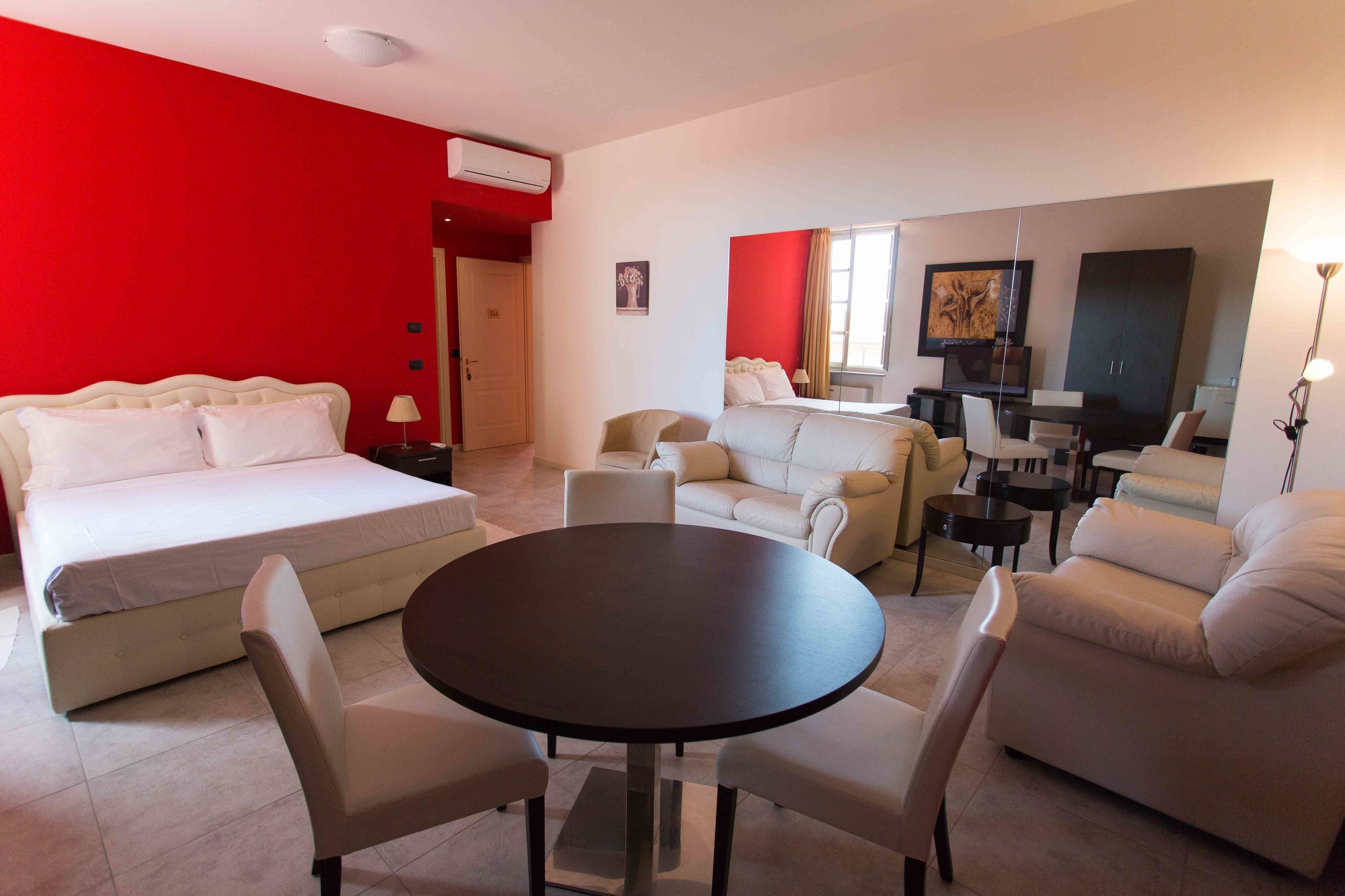 family room | egyptian cotton sheets, hypo-allergenic bedding, minibar, in-room safe