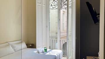 Habitación doble superior, vista a la ciudad | Sábanas de algodón egipcio, ropa de cama de alta calidad y edredón