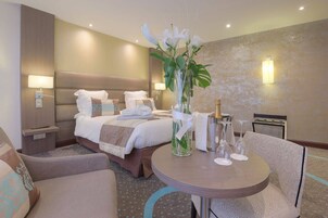 Select Comfort beds, minibar, in-room safe, desk