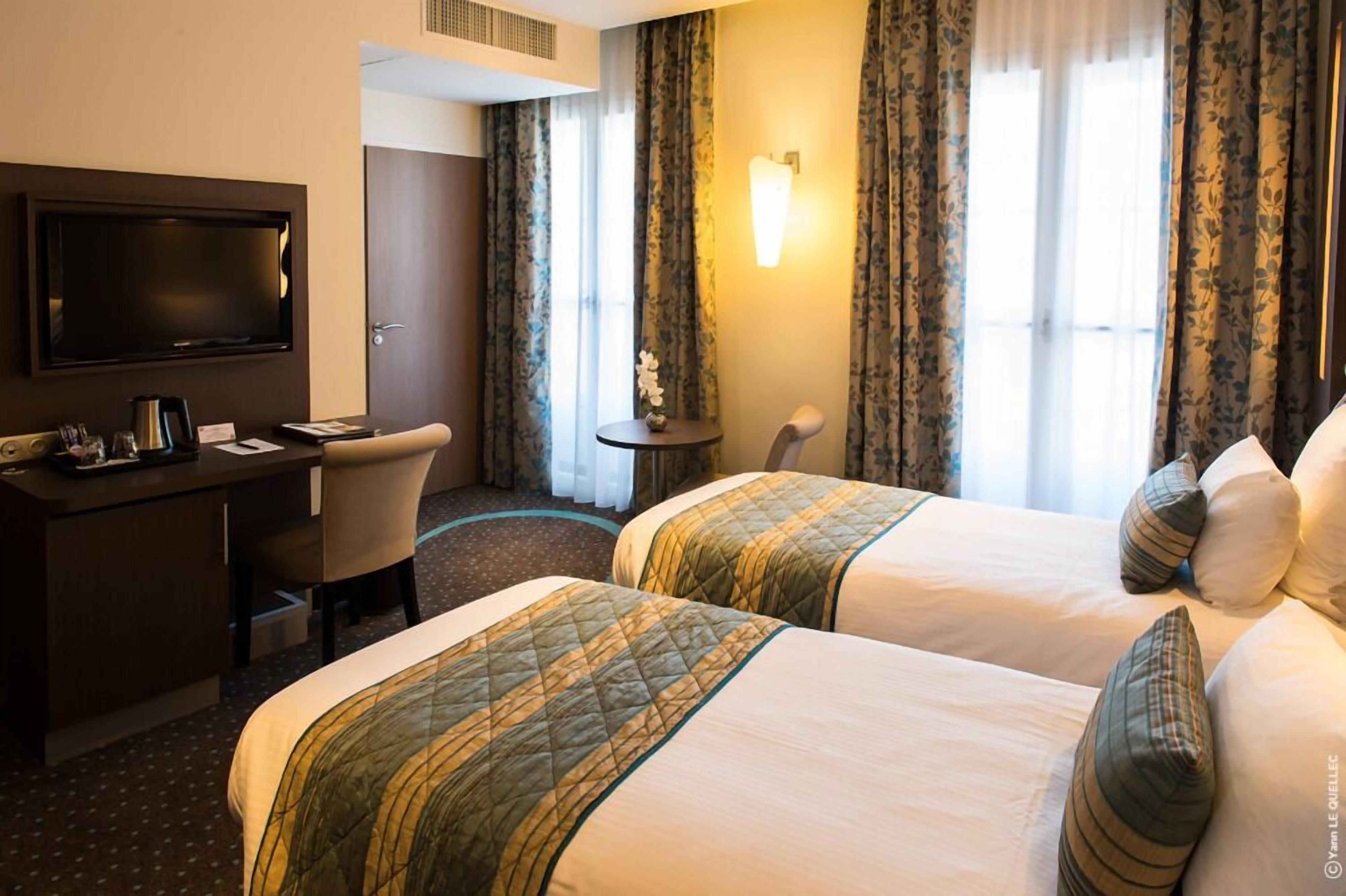 Select Comfort beds, minibar, in-room safe, desk