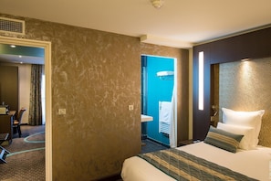 Select Comfort beds, minibar, in-room safe, desk