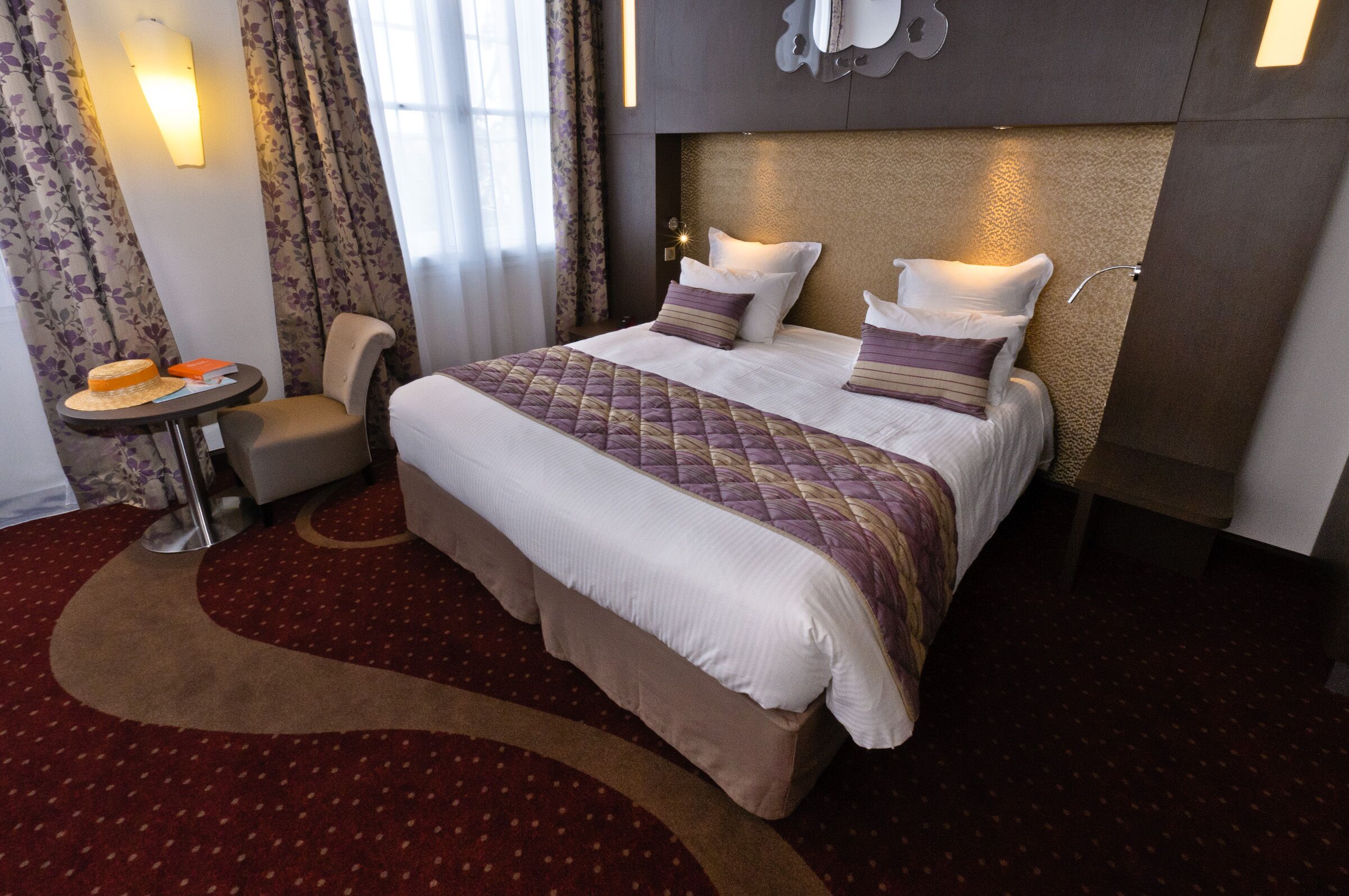 Select Comfort beds, minibar, in-room safe, desk