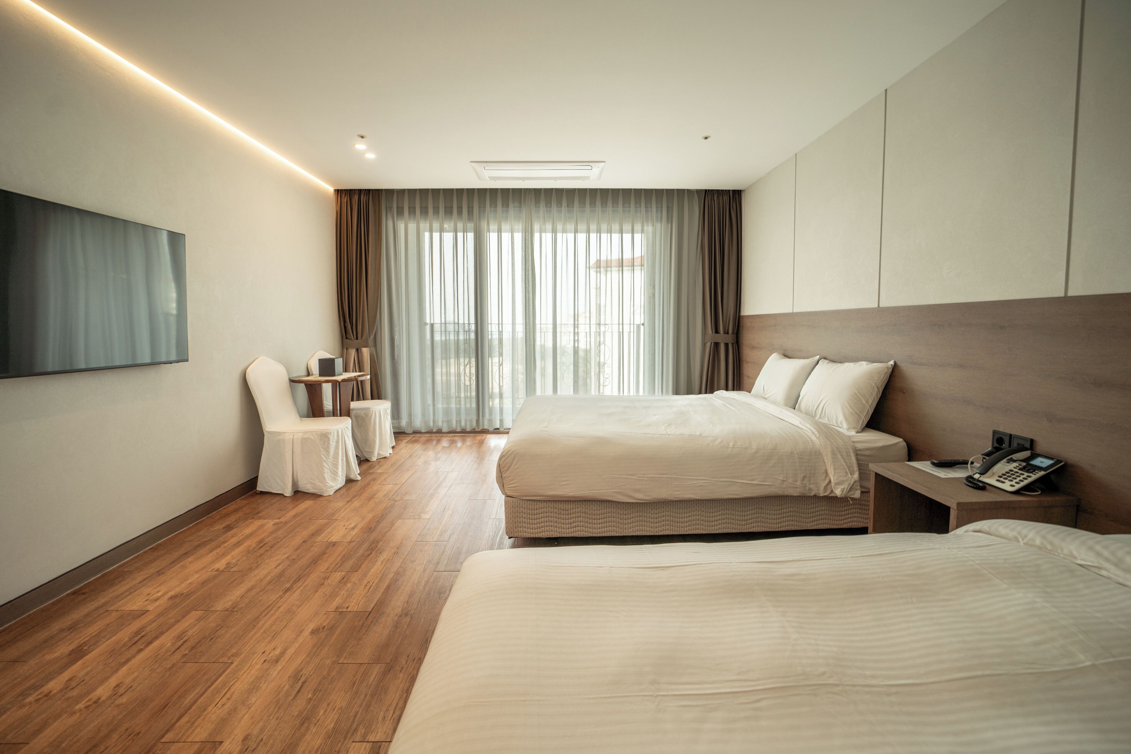 Corner Deluxe, Ocean View | Living area | 40-inch LCD TV with cable channels, TV