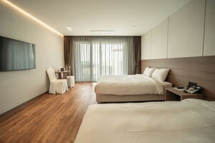 Corner Deluxe, Ocean View | Living area | 40-inch LCD TV with cable channels, TV