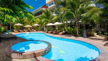 2 outdoor pools, pool umbrellas, pool loungers