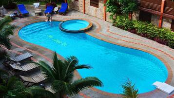 2 outdoor pools, pool umbrellas, pool loungers