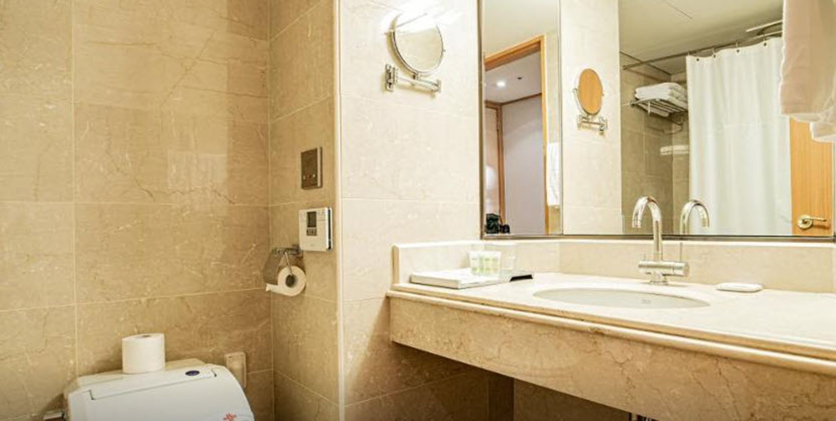 superior single room | bathroom | bathtub, free toiletries, hair dryer, bathrobes