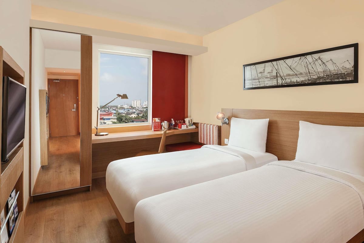 Habitación estándar, 2 camas individuales | Ropa de cama de alta calidad y minibar