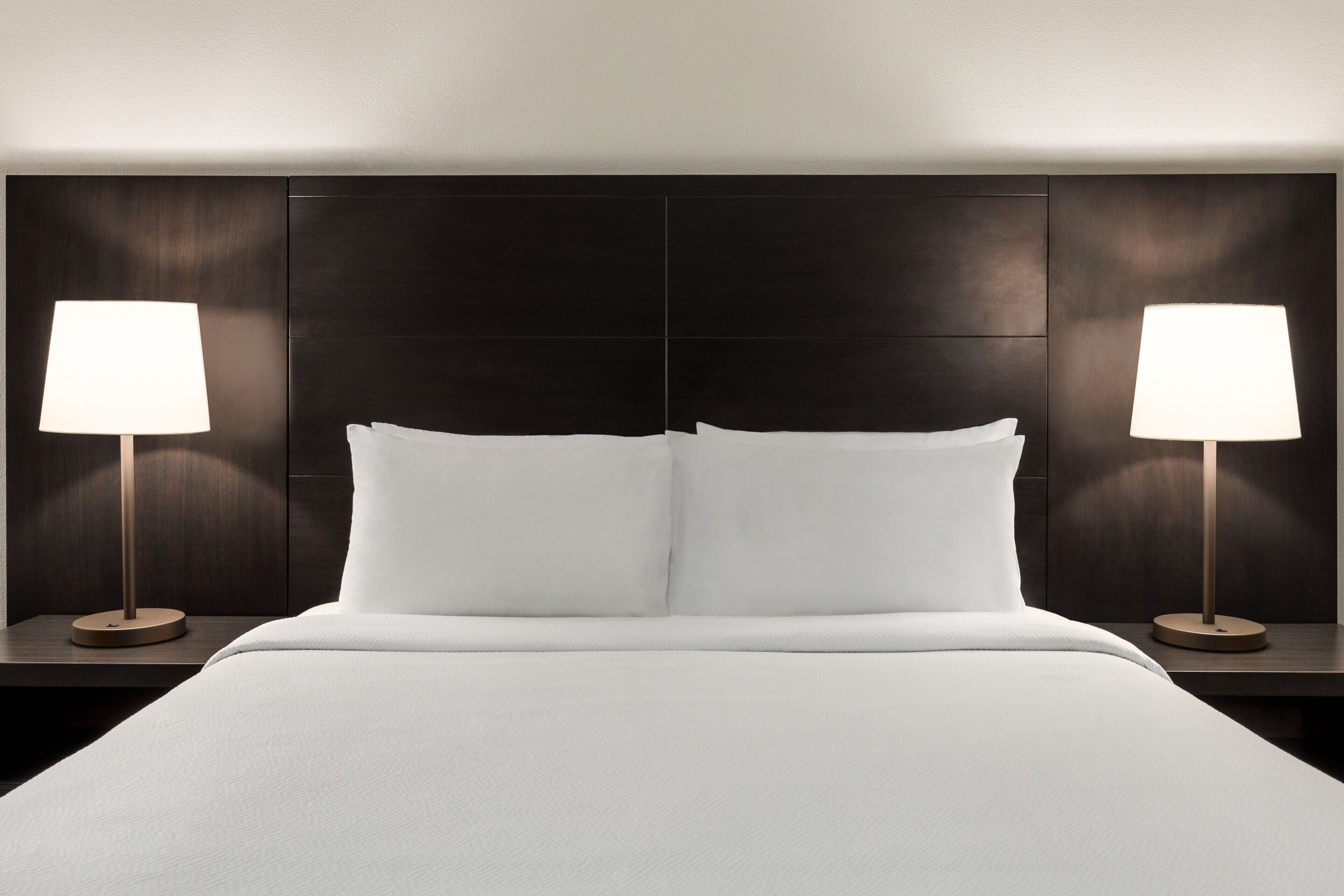 pillow-top beds, desk, blackout curtains, iron/ironing board