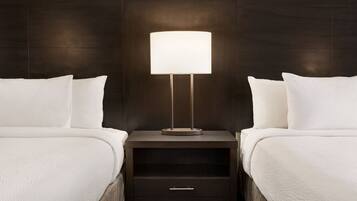 Pillowtop beds, desk, blackout drapes, iron/ironing board