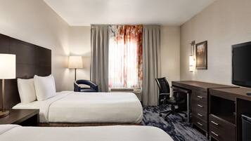 Pillow-top beds, desk, blackout curtains, iron/ironing board