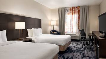 Pillow-top beds, desk, blackout curtains, iron/ironing board