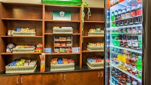 A vending machine stocked with various beverages and snacks. - Sleep Inn & Suites Mount Olive North (Mount Olive)