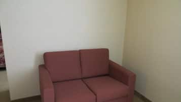 55-inch flat-screen TV with cable channels, TV