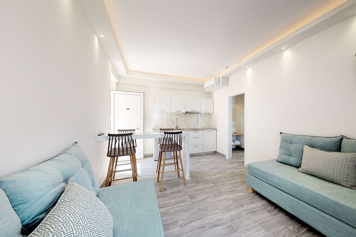 superior apartment, 1 bedroom, sea view | living area | 14-inch flat-screen tv with digital channels, tv