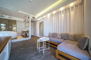 Deluxe Suite, Hot Tub, Sea View | In-room safe, desk, blackout curtains, iron/ironing board - Porto Kalamaki Hotel (Chania)