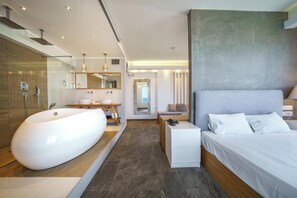 Deluxe Suite, Hot Tub, Sea View | In-room safe, desk, blackout drapes, iron/ironing board - Porto Kalamaki Hotel (Chania)