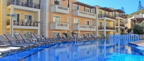 Seasonal outdoor pool, open 8 AM to 8 PM, pool umbrellas, sun loungers