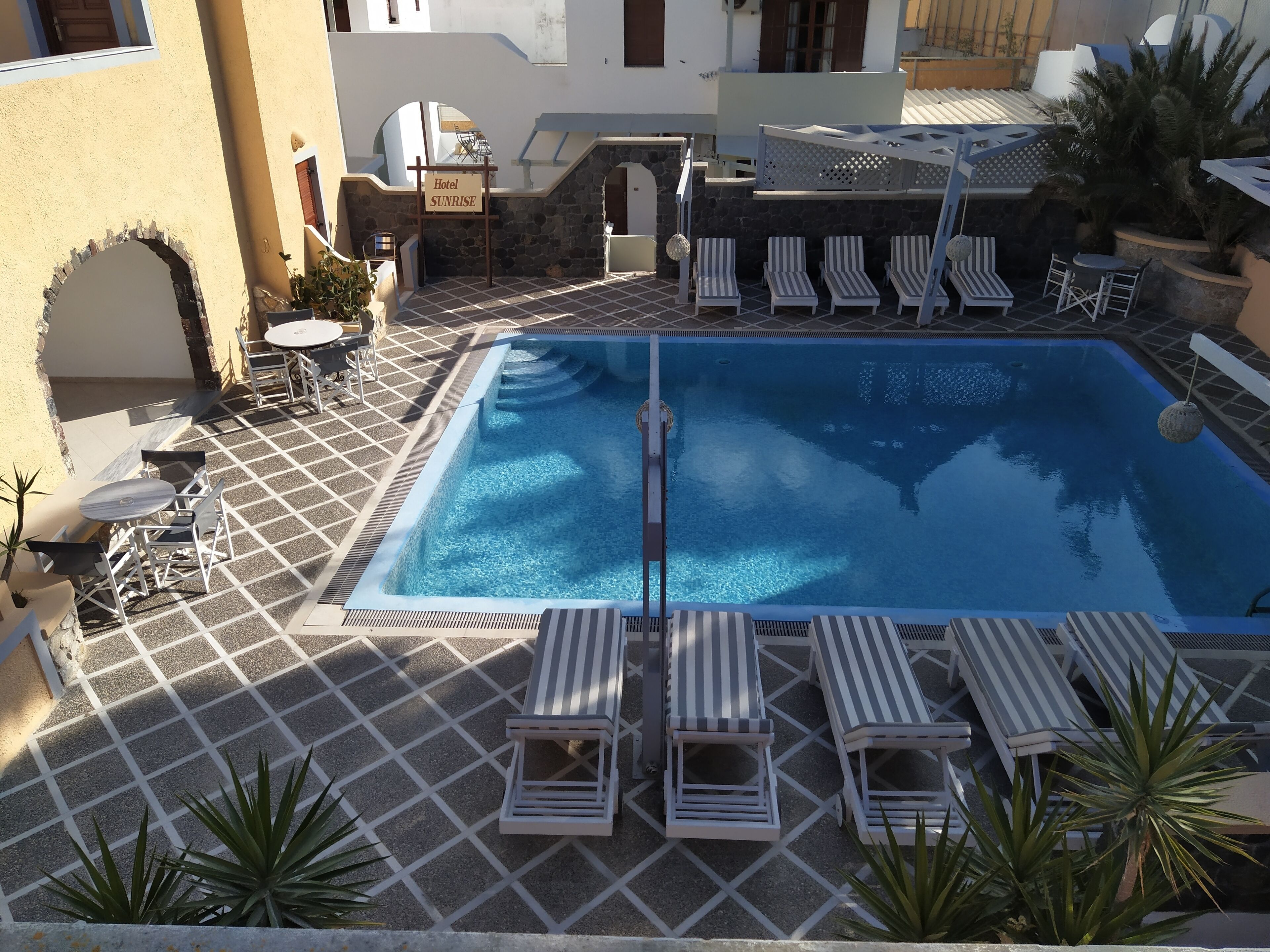 outdoor pool, pool loungers