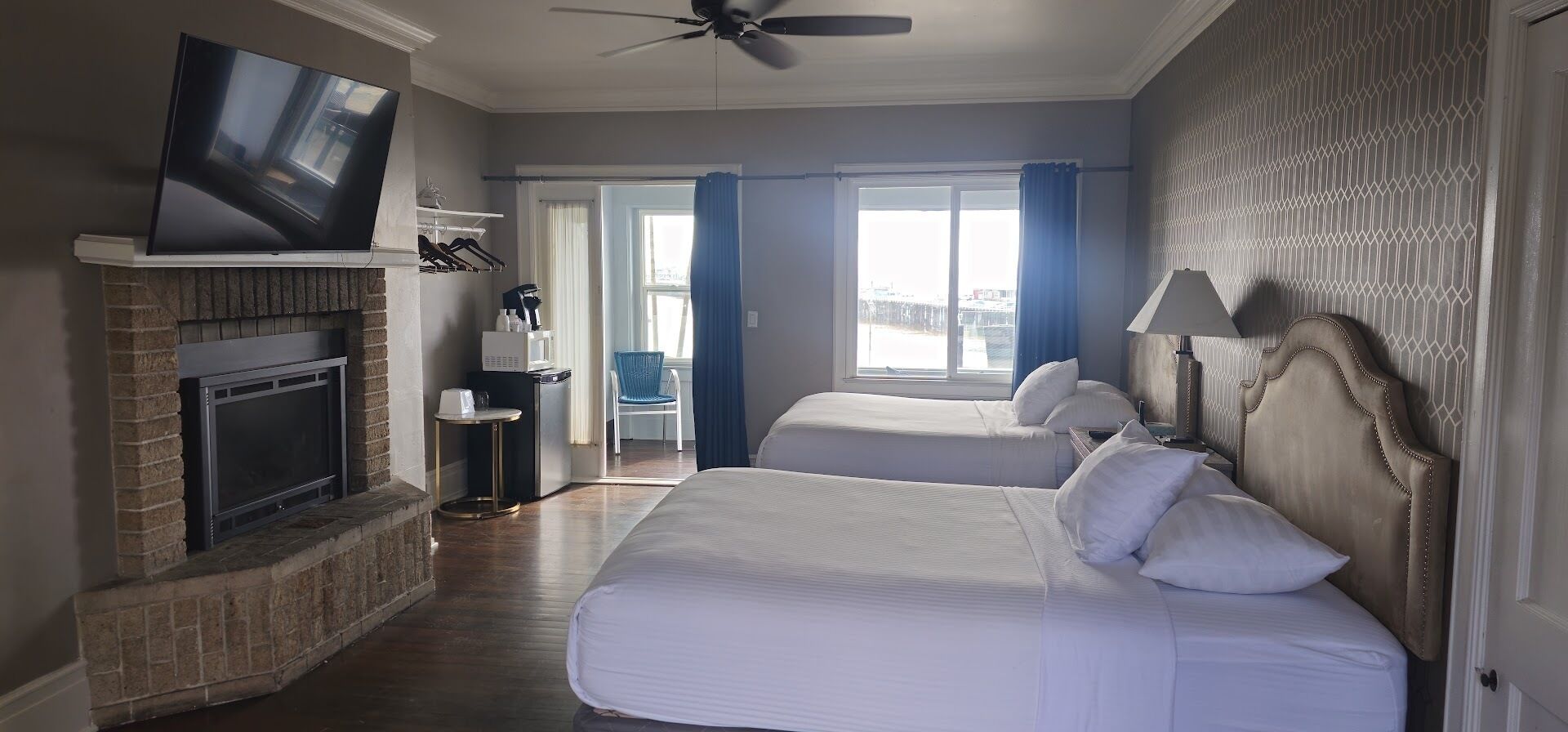 signature room, multiple beds, partial ocean view, ground floor | free wifi, bed sheets