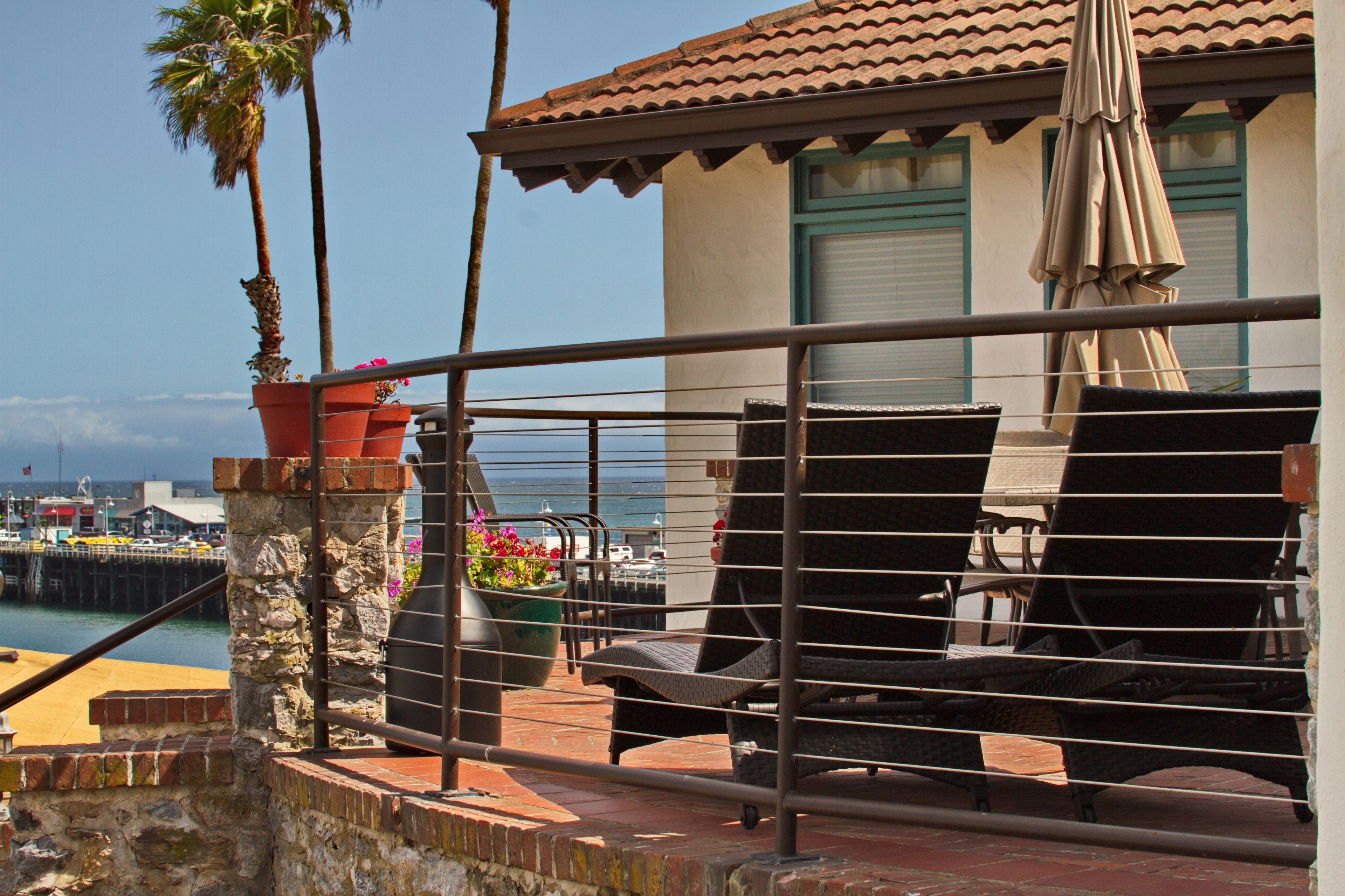 signature room, 2 queen beds, partial ocean view | balcony