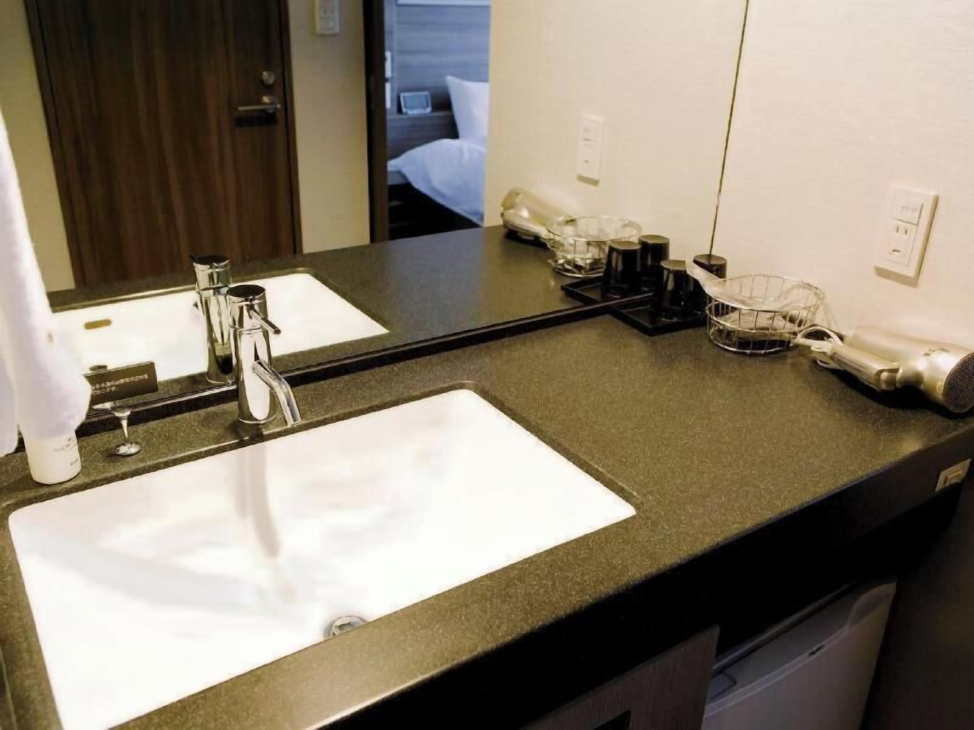 Bathroom | Shower, free toiletries, hair dryer, slippers