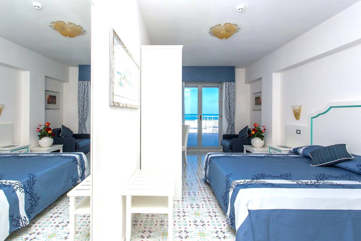 suite, sea view | 1 bedroom, premium bedding, minibar, in-room safe