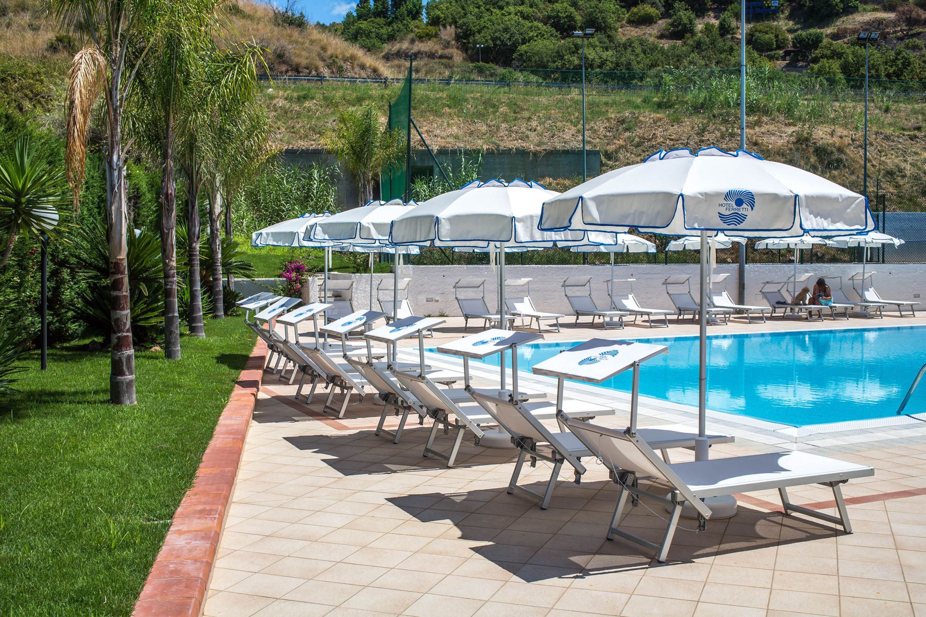 indoor pool, seasonal outdoor pool, pool umbrellas, pool loungers