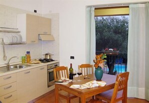 Apartment, 2 Bedrooms, Garden View | In-room dining - Residence Villa Andrea (Camerota)