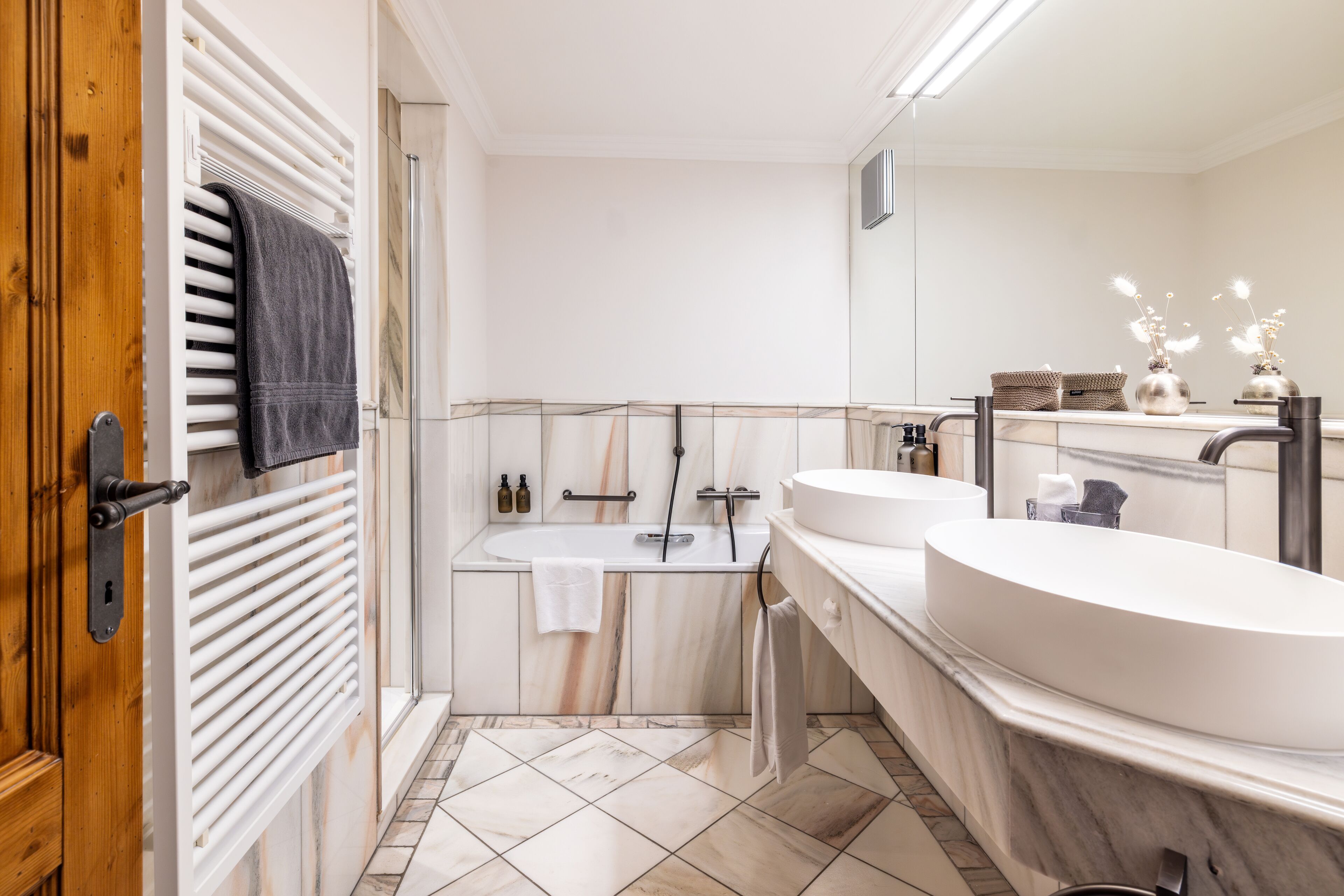 separate bathtub and shower, deep-soaking bathtub, designer toiletries