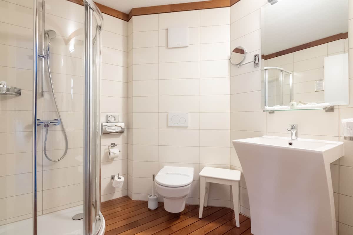 deep-soaking bathtub, eco-friendly toiletries, hair dryer, slippers