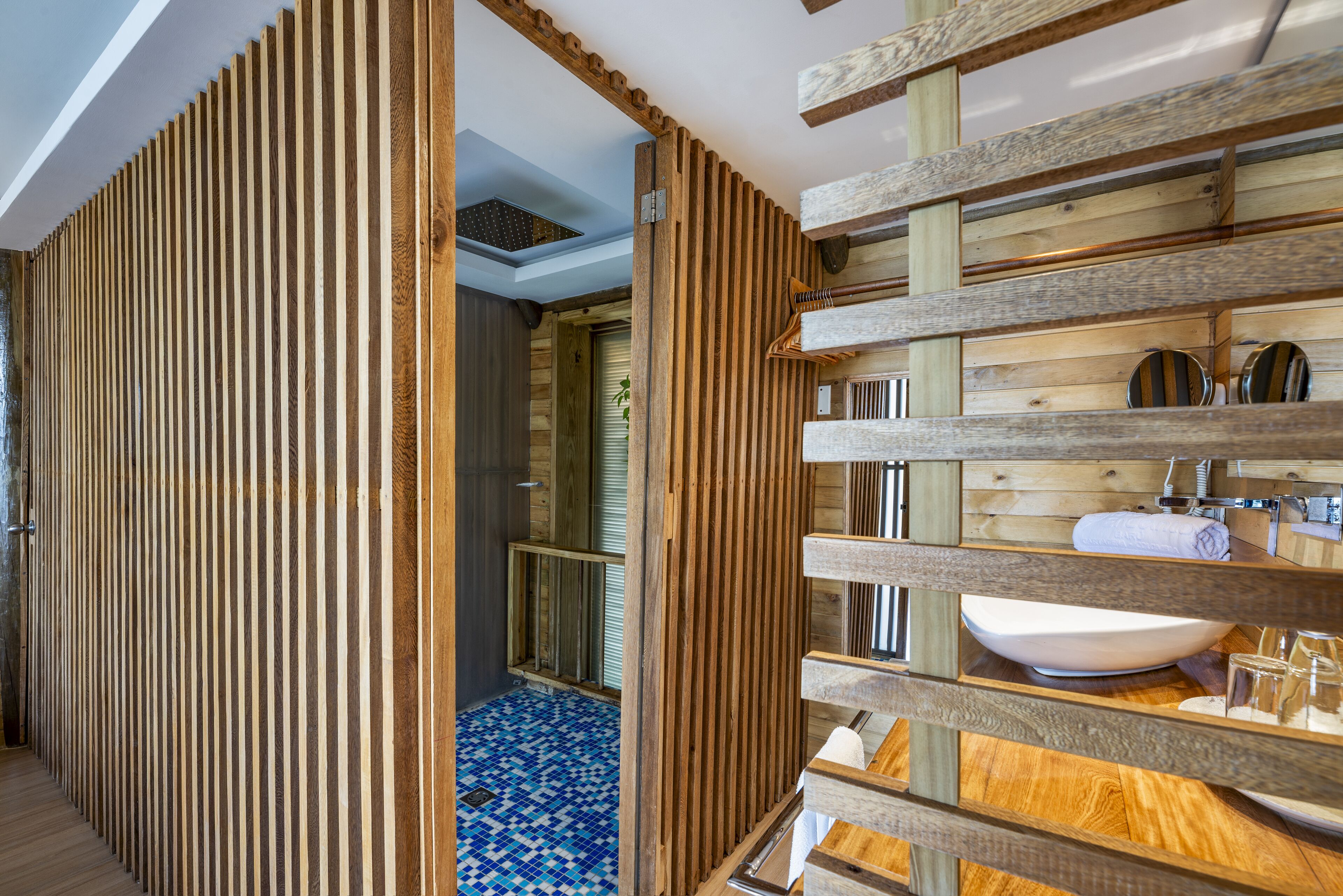 junior studio suite | bathroom | shower, rainfall showerhead, hair dryer, bathrobes