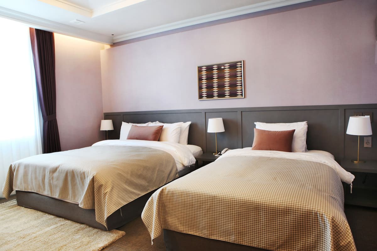 standard family twin room | in-room safe, individually decorated, individually furnished, desk