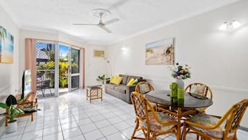 One Bedroom Apartment with Pool View | Living area | 32-inch LCD TV with digital channels, TV, Netflix