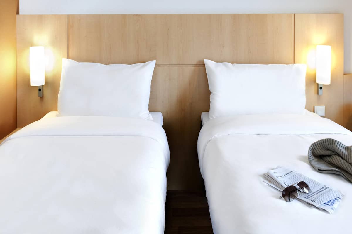 Standard Twin Room, 2 Single Beds | In-room safe, desk, soundproofing, iron/ironing board
